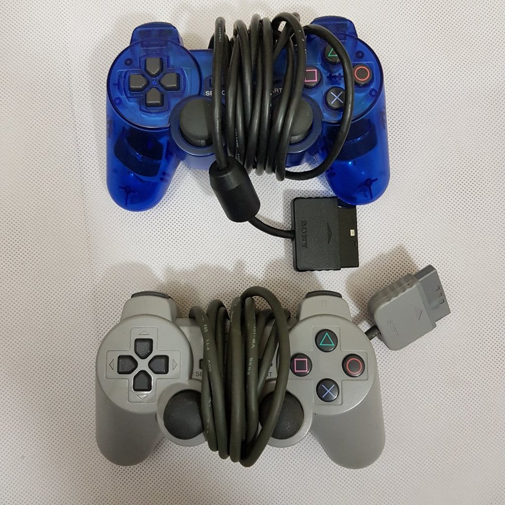 Sony Game Controllers (2) Gray Blue Family Fun. Playstation XBox I Dont Know